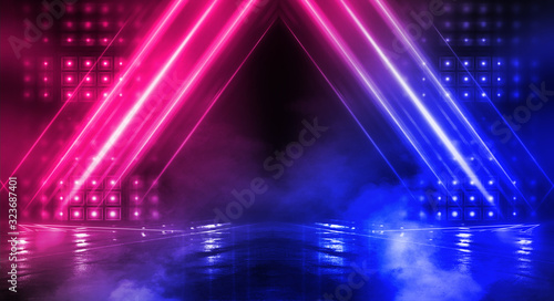 Background of empty stage show. Neon blue and purple light and laser show. Laser futuristic shapes on a dark background. Abstract dark background with neon glow