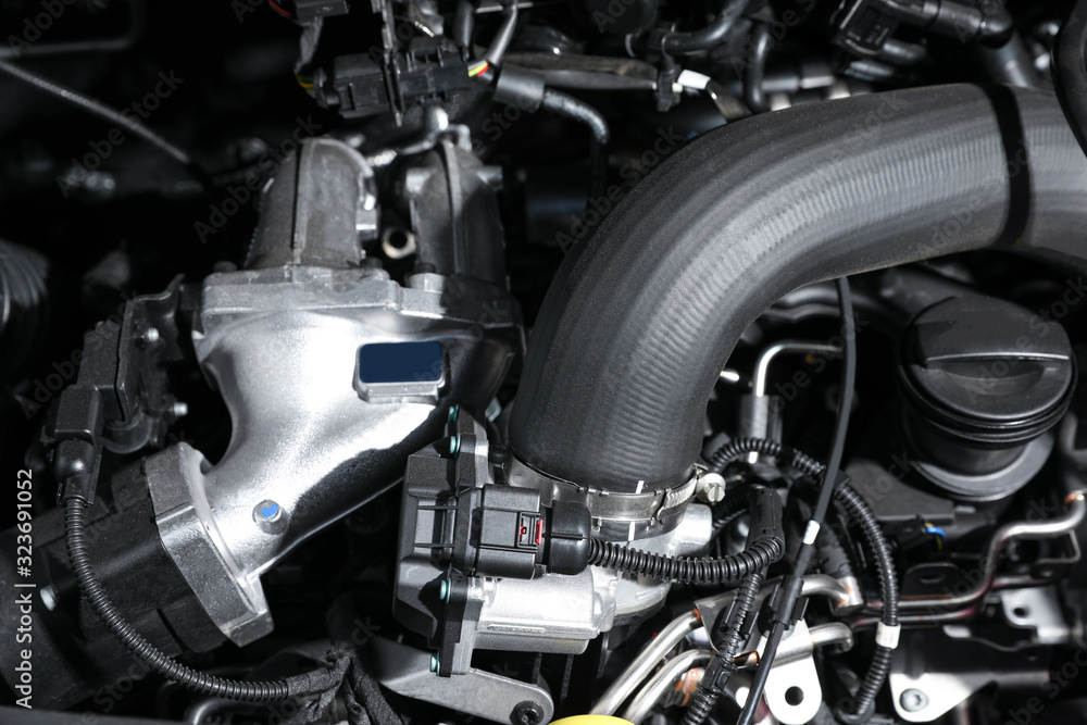 Closeup view of engine bay in modern car Closeup view of engine bay in modern car