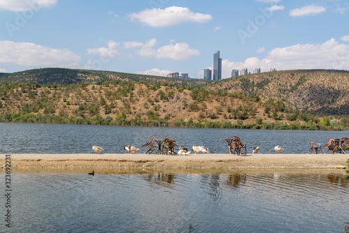 Ankara/Turkey - September 01 2019: Lake Eymir and skyscraper in background photo