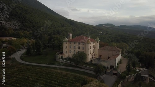 Wallpaper Mural Aerial footage of the beautiful medieval castle near mountain village, France Torontodigital.ca