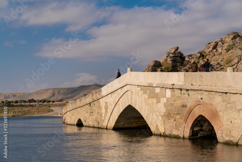 Kirikkale/Turkey-October 27 2019: Multi arched stone bridge (Tas kopru), Cesnigir Bridge on Kizilirmak River. photo