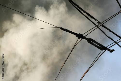 Wallpaper Mural Smoke from a fire in a burning building against a blue sky Torontodigital.ca
