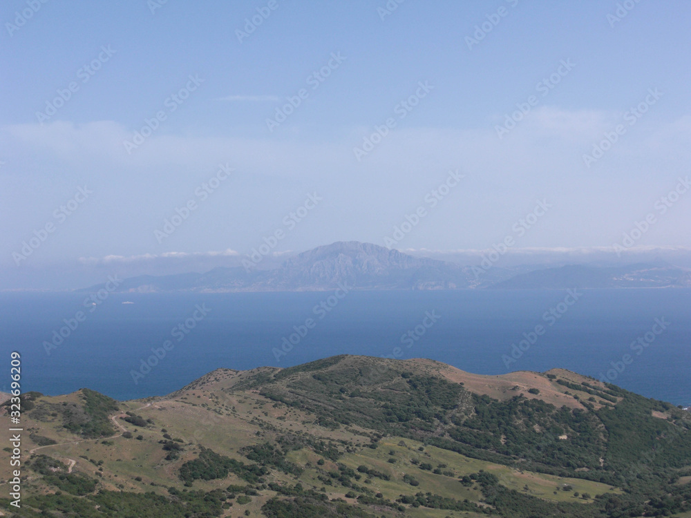 views of the sea and an island from the top of a mountain