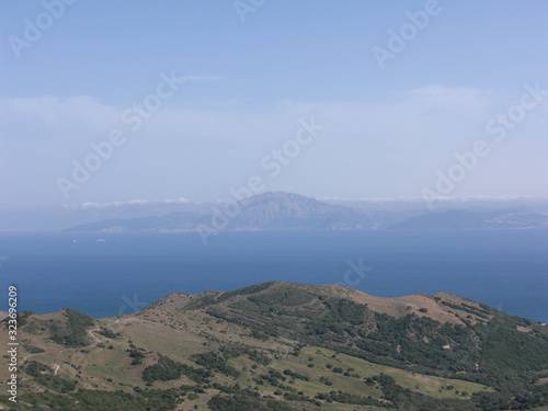 views of the sea and an island from the top of a mountain © DaviniaBelinda