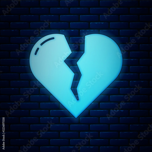 Glowing neon Broken heart or divorce icon isolated on brick wall background. Love symbol. Valentines day. Vector Illustration