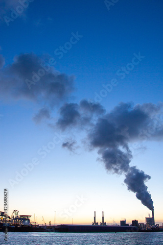 smoke from a refinery chimney dusk