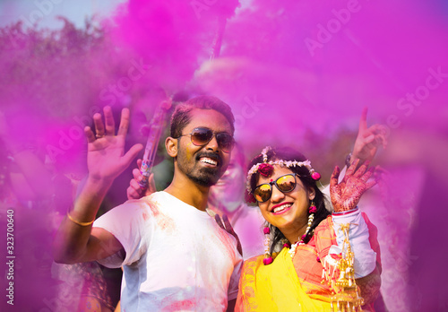 Indian Couple Dancing and Playing With Colors