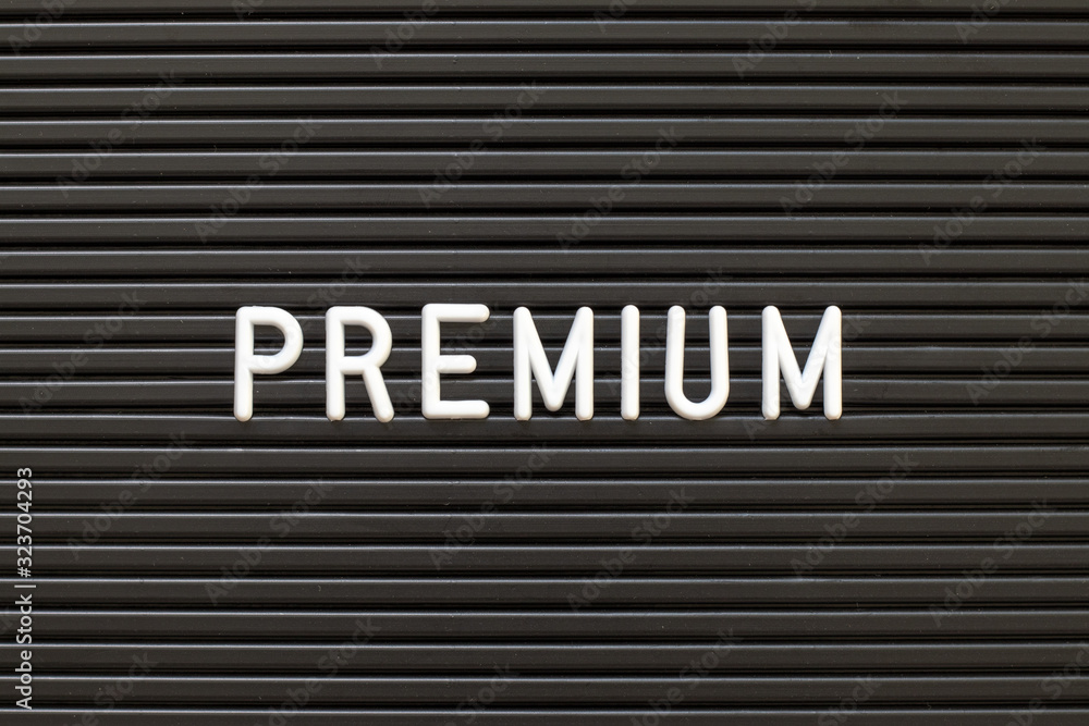Black color felt letter board with white alphabet in word premium background Black color felt letter board with white alphabet in word premium background