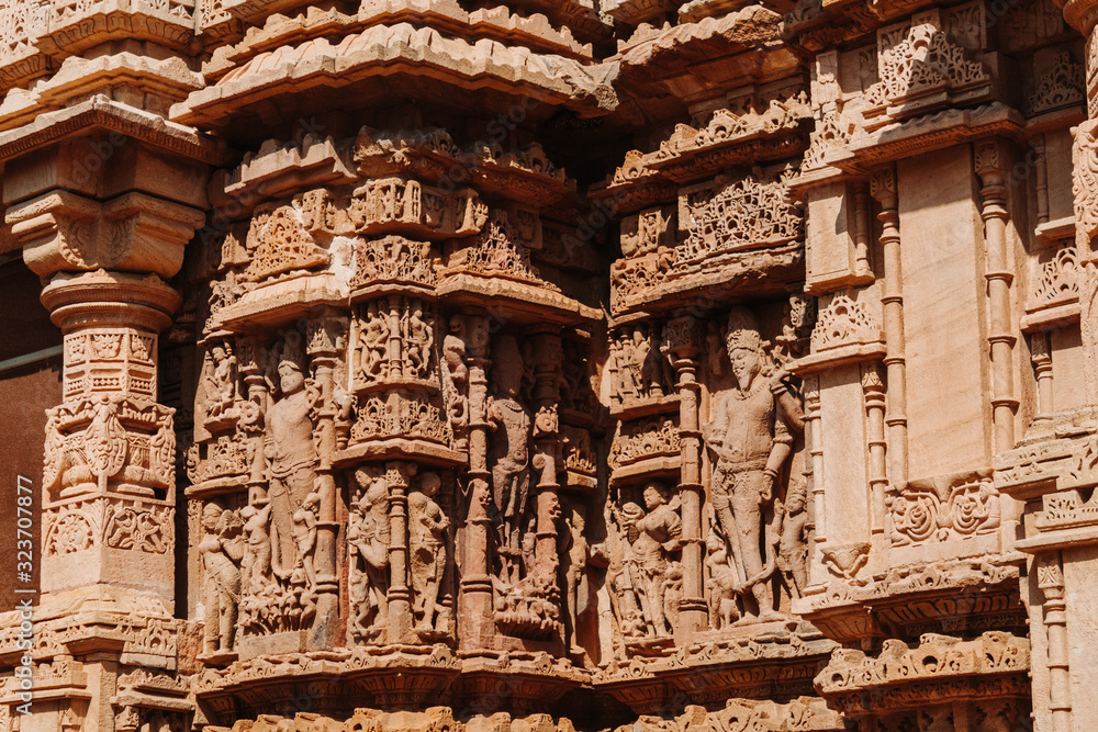 Closeup shot of the ancient carvings in the wall of the Sun Temple at Modhera in Gujarat, India