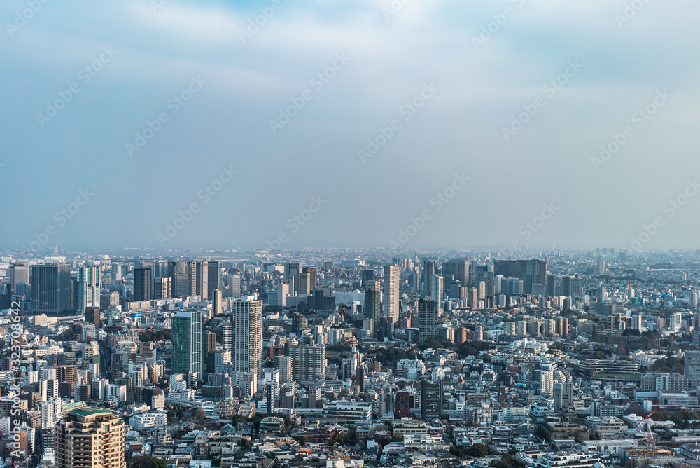 Asia Business concept for real estate and corporate construction - panoramic modern city skyline bird eye aerial view of tokyo tower and vivid blue sky in Roppongi Hill, Tokyo, Japan