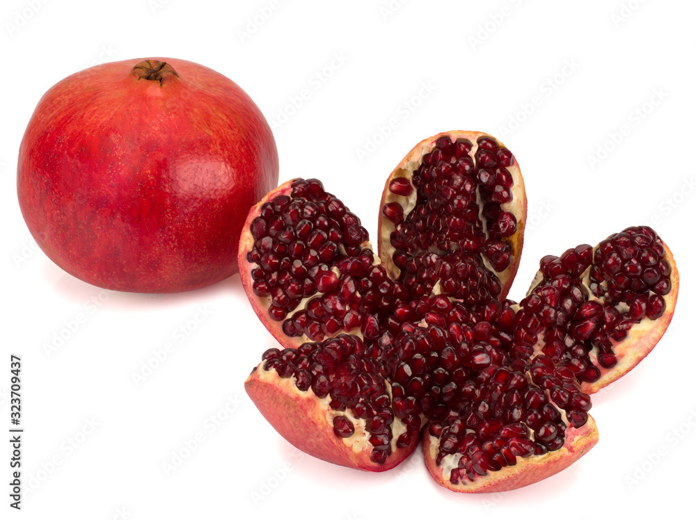 Pomegranate and cracked pomegranate isolated on a white background Pomegranate and cracked pomegranate isolated on a white background
