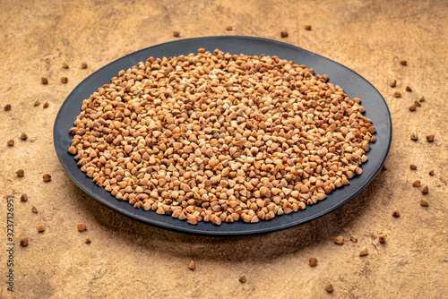 buckwheat kasha on a black plate