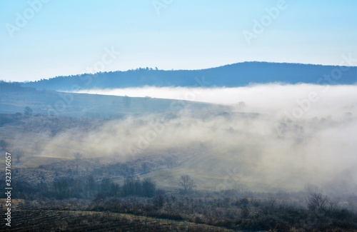 landscape with fog in the valley