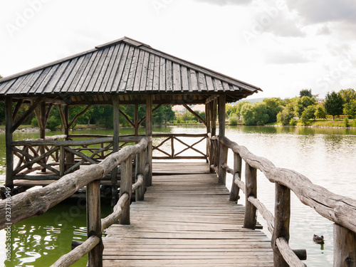Wooden shelter on a quiet lake