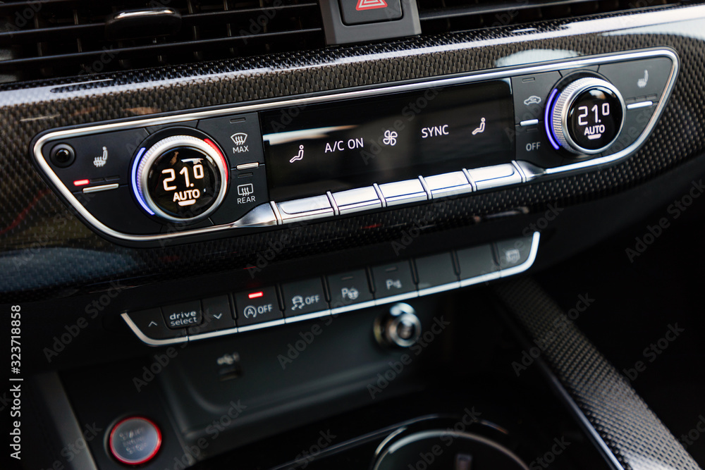 Fototapeta premium Control buttons on dashboard of a car