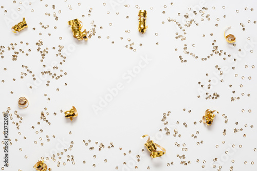 Golden confetti frame and copy space