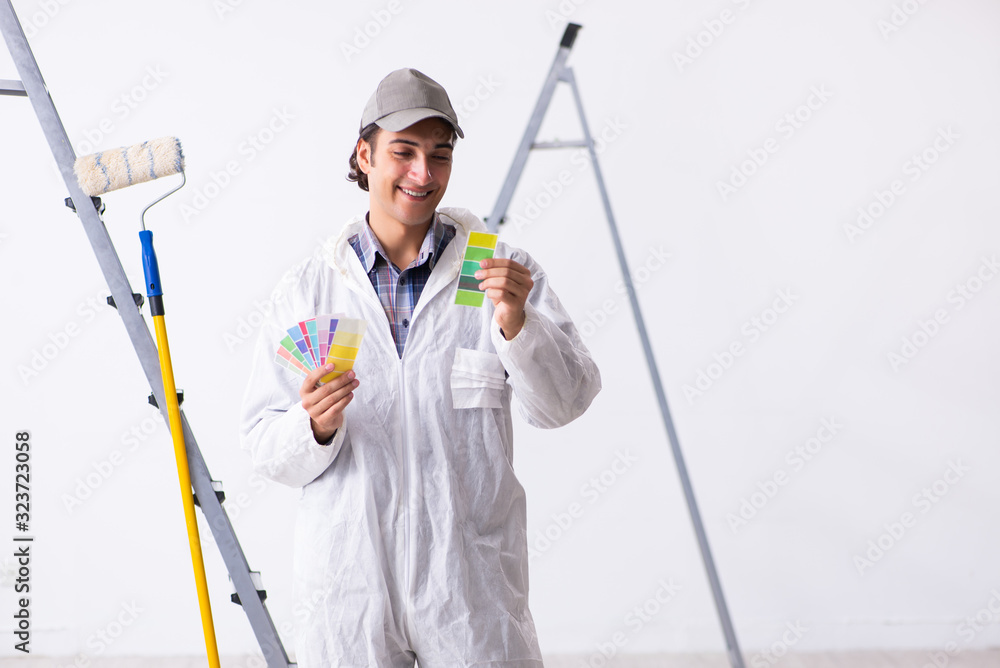 Painter working at construction site Painter working at construction site