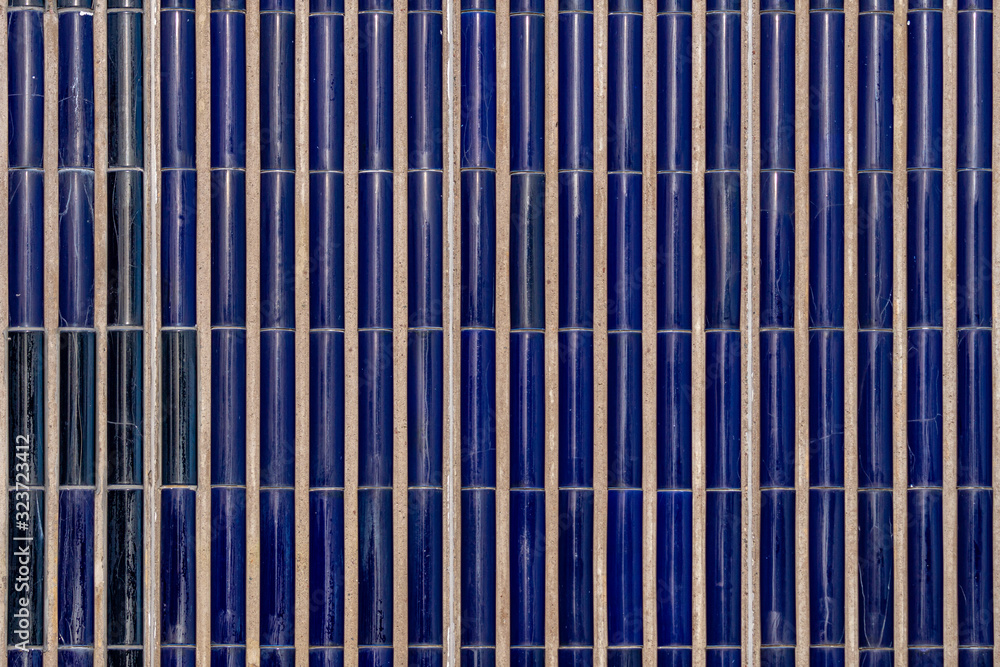 Cobalt blue mosaic wall in sunlight Cobalt blue mosaic wall in sunlight