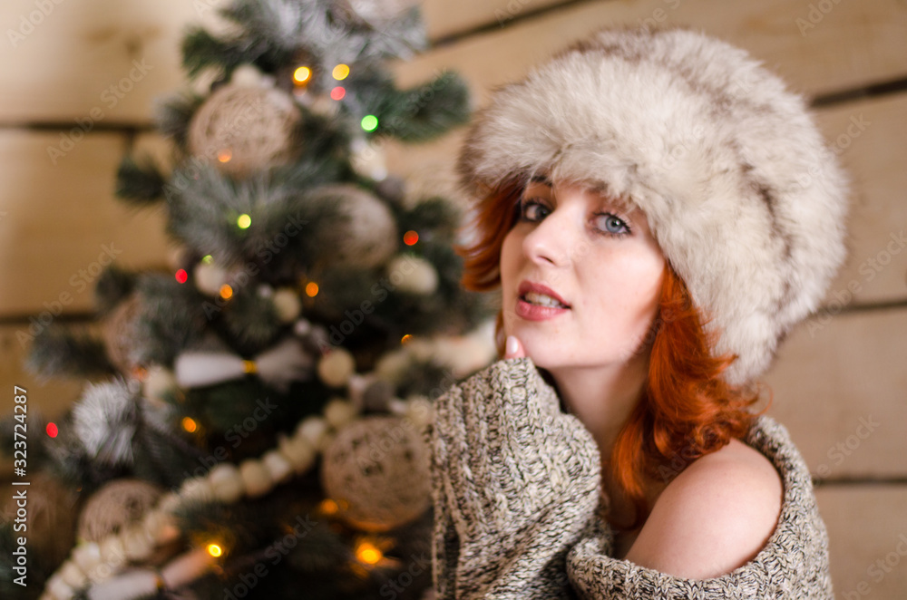 Beautiful sexy redhead girl in a New Year's Beautiful sexy redhead girl in a New Year's
