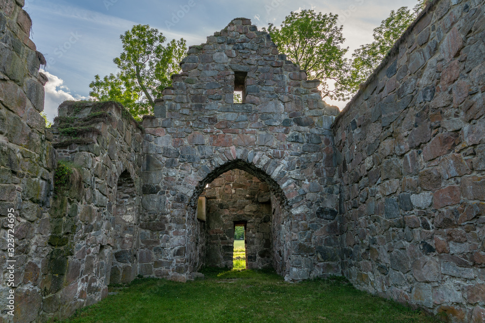Remaining stone walls of a medieval church in Sweden