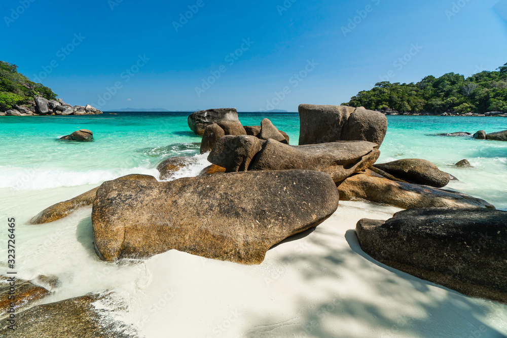 Tropical beach and rocky coastline and beautiful forest. Nyaung Oo Phee Island Myanmar. Space for entering text Tropical beach and rocky coastline and beautiful forest. Nyaung Oo Phee Island Myanmar. Space for entering text