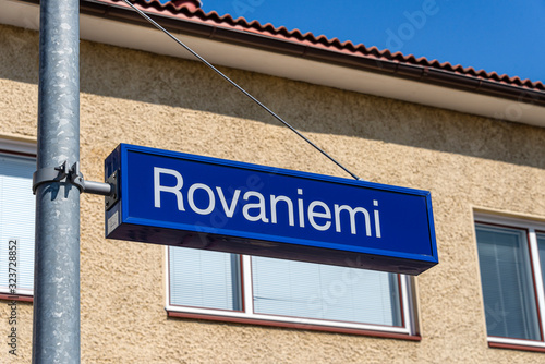 Republic of Finland, Rovaniemi: Central railway station name sign in the city center of the Finnish town - concept public transport travel train arrival departure direction terminal.