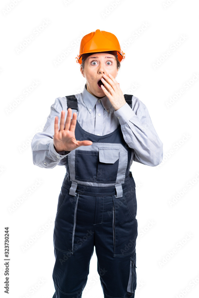 The builder girl was very scared. isolated The builder girl was very scared. isolated