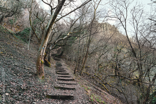 Hiking trail in hungary part of the hungarian national blue trail with basalt columns on the Saint George hill photo