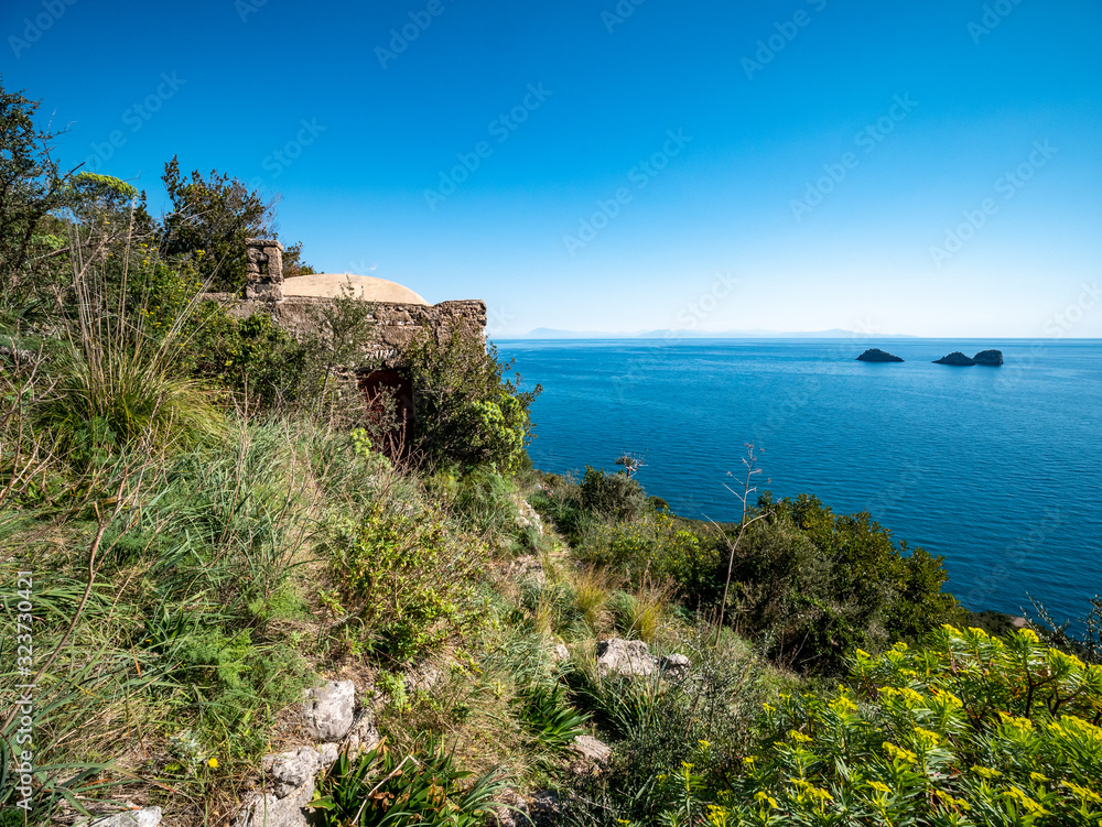 rural house on the Tyrrhenian sea and Li Galli islets in the background. Amalfi Coast, Campania, Italy