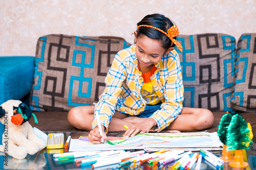 Canvas Print Happy little Cute little preschooler child drawing at home