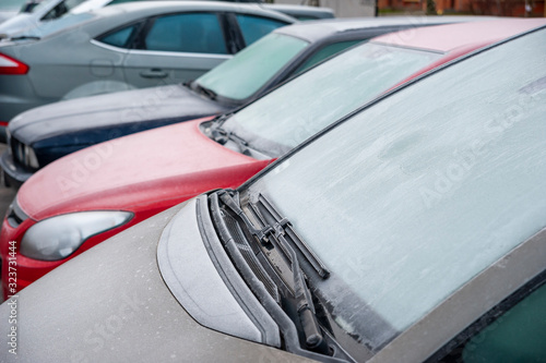 Closeup of frozen cars on a cold winter day