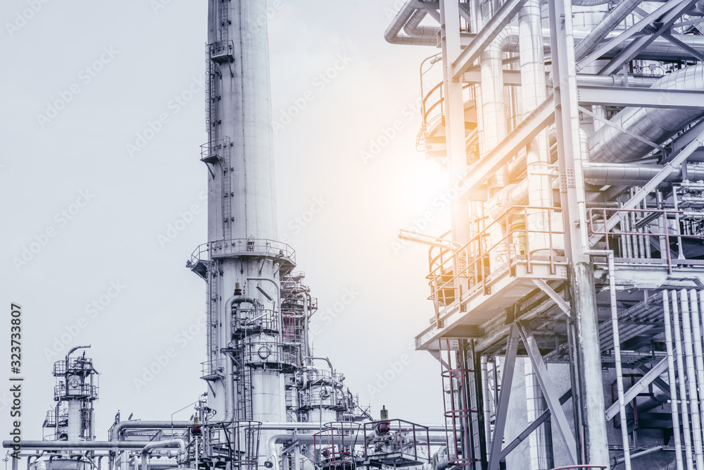 Industrial zone,The equipment of oil refining,Close-up of industrial pipelines of an oil-refinery plant,Detail of oil pipeline with valves in large oil refinery. Industrial zone,The equipment of oil refining,Close-up of industrial pipelines of an oil-refinery plant,Detail of oil pipeline with valves in large oil refinery.