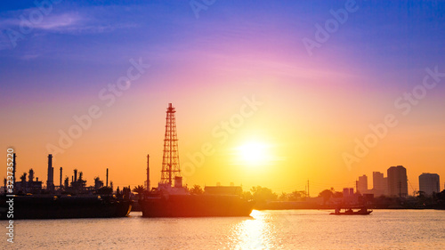 Oil refinery or petrochemical industry with ship in thailand. for Logistic Import Export background.