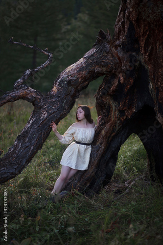  Girl near the larch. © AKaltykova