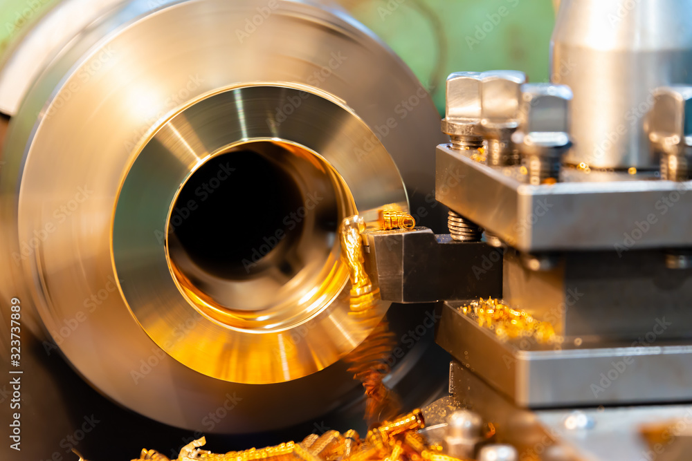 Bronze on a lathe, processing and manufacturing of parts from brass on a CNC machine. Bronze on a lathe, processing and manufacturing of parts from brass on a CNC machine.