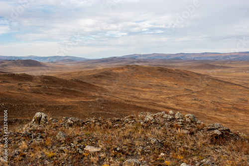 Obraz na plátně Beautiful steppe landscape with hills and stones