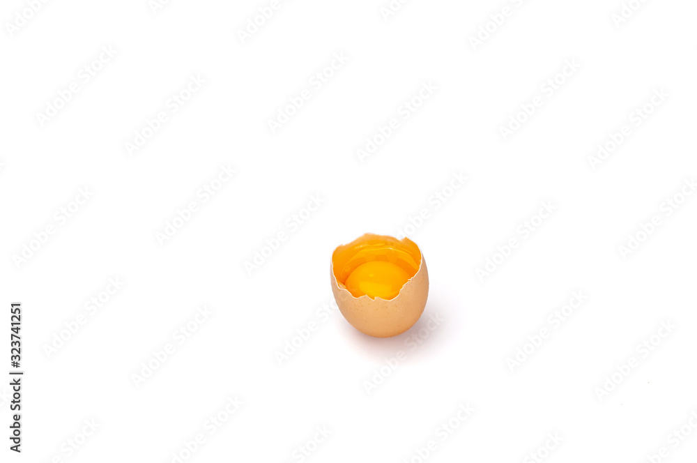 The raw yolk and white broken egg shell. The raw yolk and white broken egg shell.