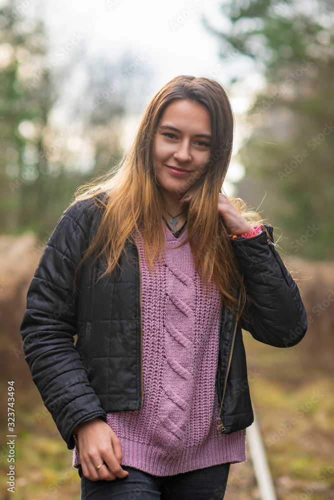 Portrait of a beautiful girl in the autumn forest. Portrait of a beautiful girl in the autumn forest.