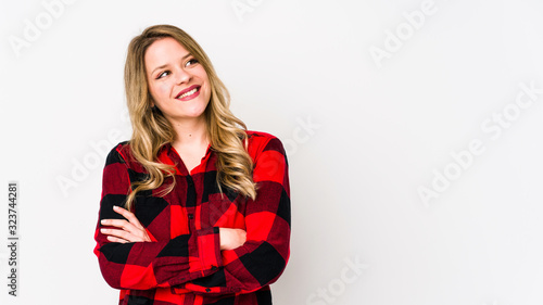 Young cauciasian woman isolated on white background smiling confident with crossed arms.