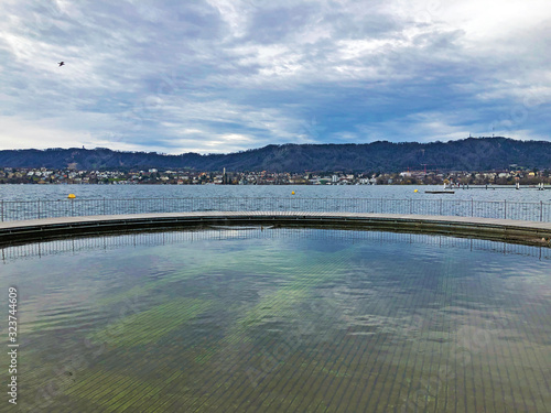 A water observation Zürichsee Kreisel (Zurichsee Kreisel or Zuerichsee Kreisel) post in Tiefenbrunnen public beach - Zurich (Zurich or Zuerich), Switzerland photo