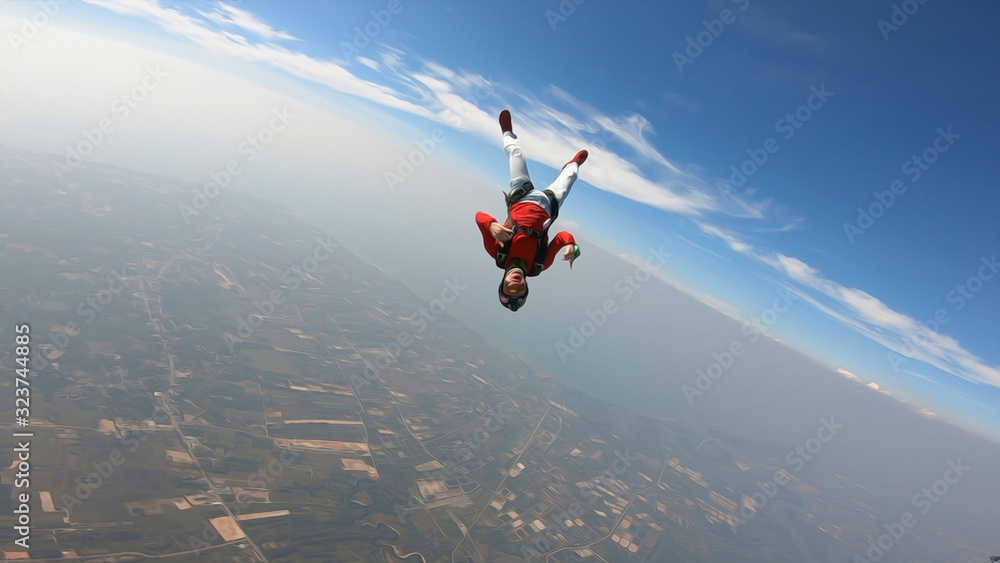 Planet. Skydiver travels around the world. There are no rules for brave people. The sky without borders. Planet. Skydiver travels around the world. There are no rules for brave people. The sky without borders.