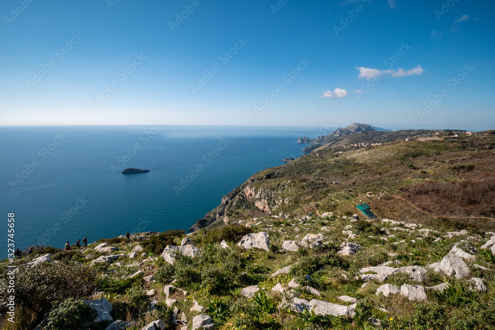 panorama of the Sorrento peninsula with hikers, Amalfi Coast, Campania, Italy