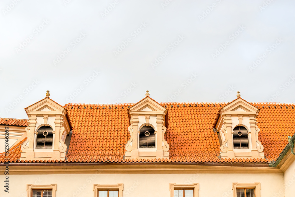 View of the top of old buildings with red roof and dramatic sky at Prague city Czech republic. View of the top of old buildings with red roof and dramatic sky at Prague city Czech republic.