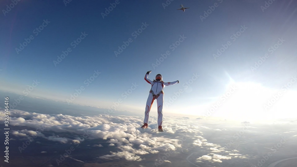 lifestyle. Skydiver conquers the world. Skydiving team use professional equipment. Extreme sport for young men.
