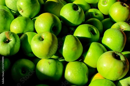 Green apples at street market