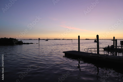 Floating docks in marina at dusk