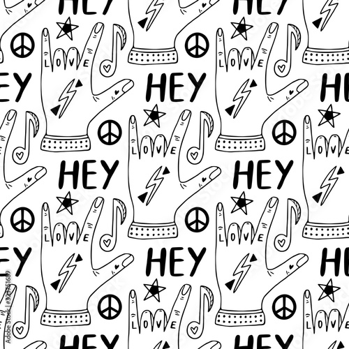 Rock hand sign pattern. Doodle background.
