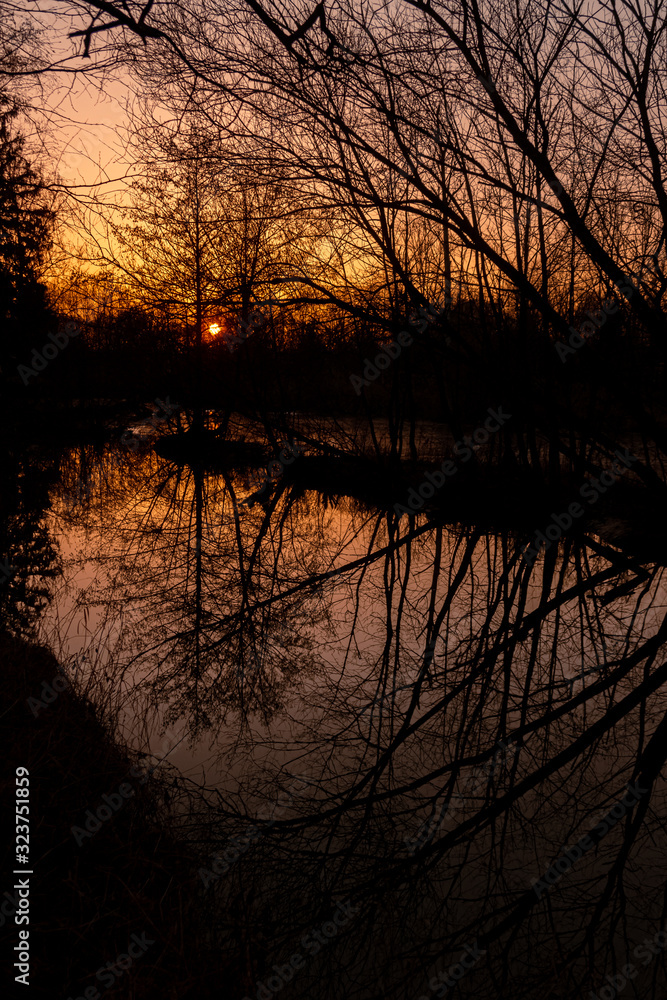 Beautiful sunset with reflections at Arnstorf, Bavaria, Germany Beautiful sunset with reflections at Arnstorf, Bavaria, Germany