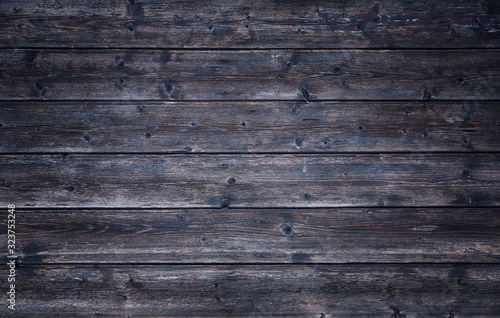 Dark brown wooden planks. Copy space background