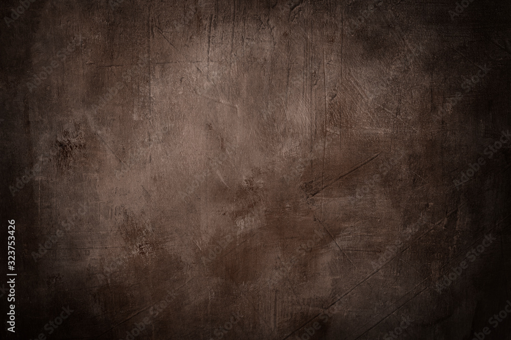 grunge brown background or texture with dark vignette borders